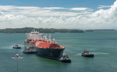 Large transport ship moving across Gatun Lake in the Panama Canal clipart