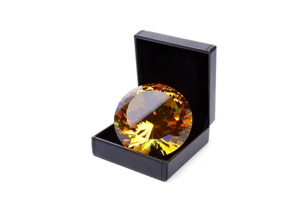 Yellow diamond in a gift box — Stock Photo, Image