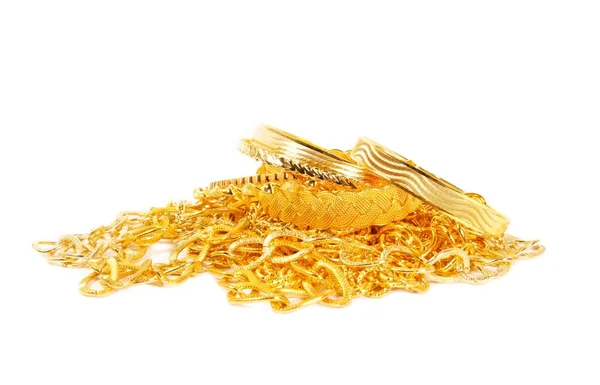 Haufen Goldketten und Armbänder Stockbild