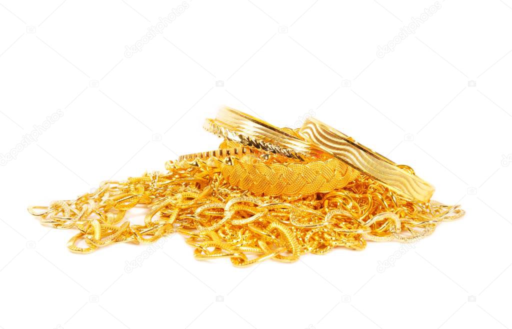 Pile of gold chains and bracelets