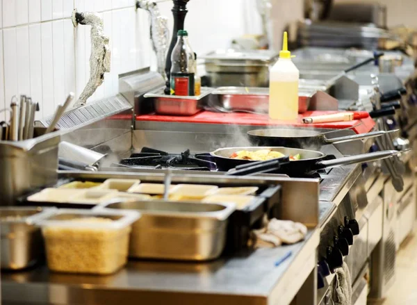 Work surface and kitchen equipment in professional kitchen — Stock Photo, Image