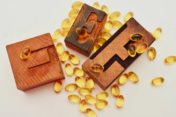 Vitamin Soft Gel Capsules Wooden Typographic Letter Healthcare Immunity Support — Stock Photo, Image