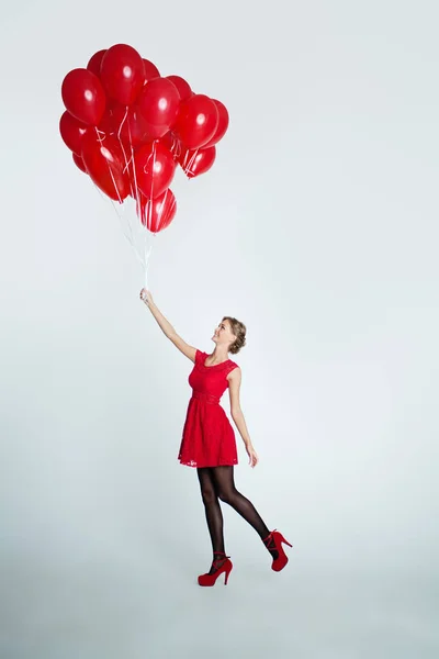 Cute Woman Red Dress Holding Balloons Holiday Background — Stock Photo, Image