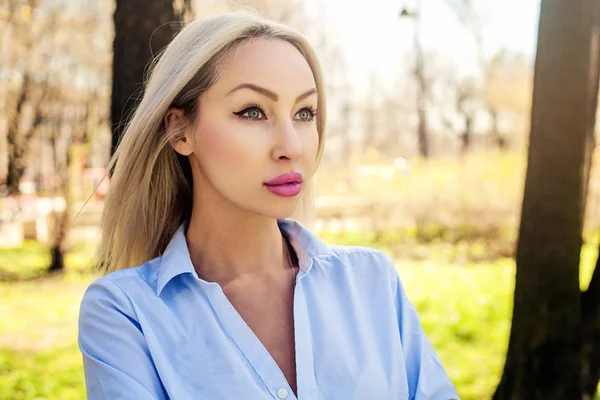 Successful woman, outdoors portrait