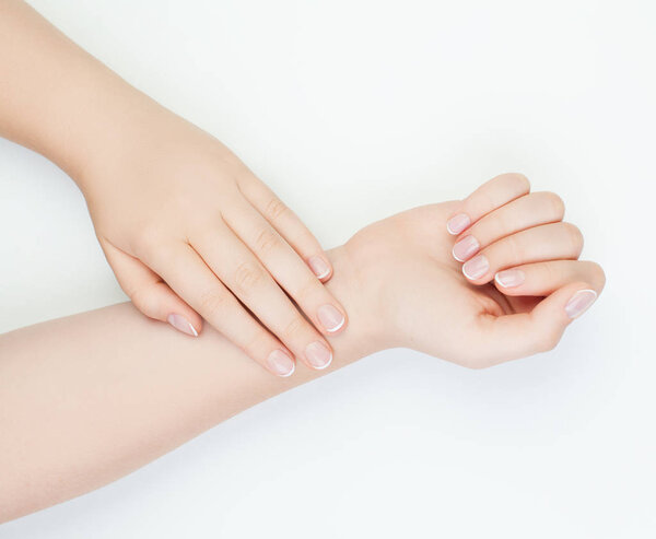 female hands with Beautiful  nails on white background. Manicure concept 