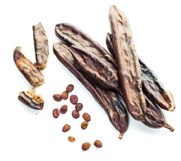 Ekologiskt Carob Skida Med Frön Vit Bakgrund — Stockfoto