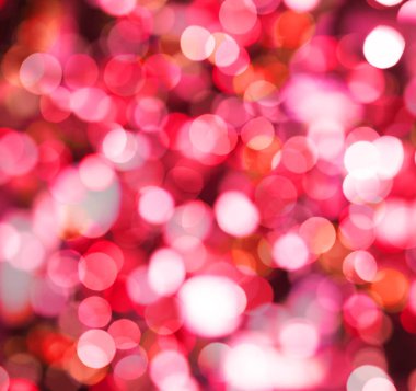 Kırmızı arka plan ile soyut bokeh glitter ışık ışıltı