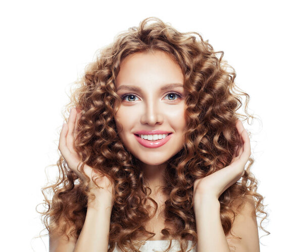 Happy woman smiling and touching her hair her hand isolated on white. Haircare concept 