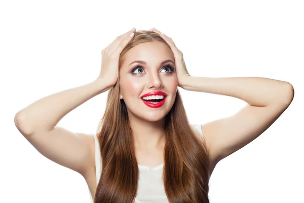 Happy surprised woman looking up  isolated on white background — Stock Photo, Image