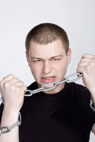 Man's Hands in chain shackles on white background. Freedom concept — Stock Photo, Image