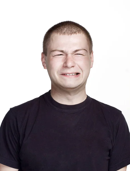 Funny face. Portrait of young man with Facial expression. — Stock Photo, Image