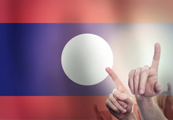 Mãos no fundo da bandeira do Laos. Conceito de liberdade — Fotografia de Stock