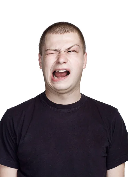 Αηδιαστικό πρόσωπο με ανοιχτό στόμα. Πορτρέτο του νεαρού άνδρα. — Φωτογραφία Αρχείου