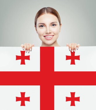 Gürcistan bayrak arka plan ile mutlu kız gülümseyen öğrenci