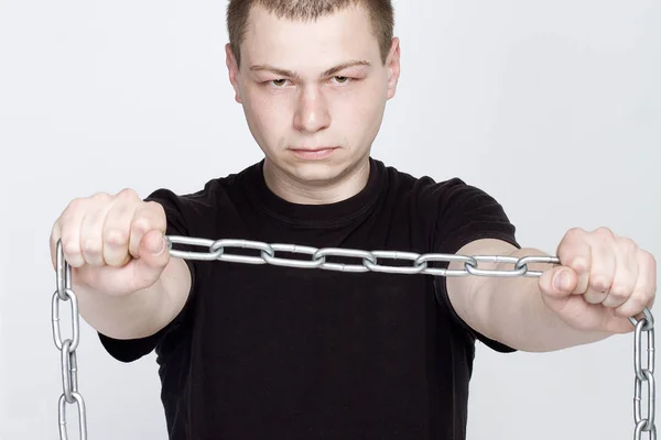 Man and shackles. The concept of freedom and slavery — Stock Photo, Image