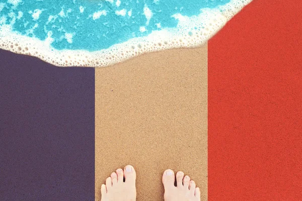 Feet on sea sand and surf. Vacation on ocean beach — Stock Photo, Image