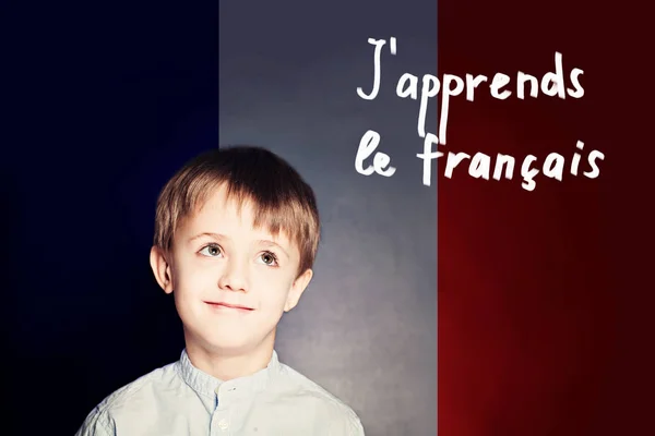 Learn french language concept. Happy child student