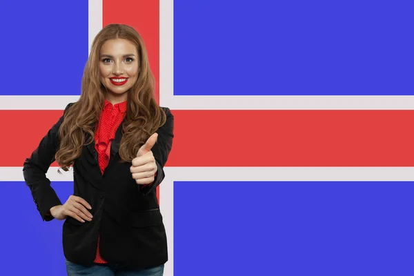 Iceland concept with cute happy woman against the Icelandic flag — Stock Photo, Image