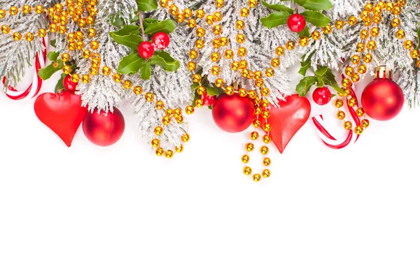 Christmas composition with red holly berries, glass baubles — Stock Photo, Image