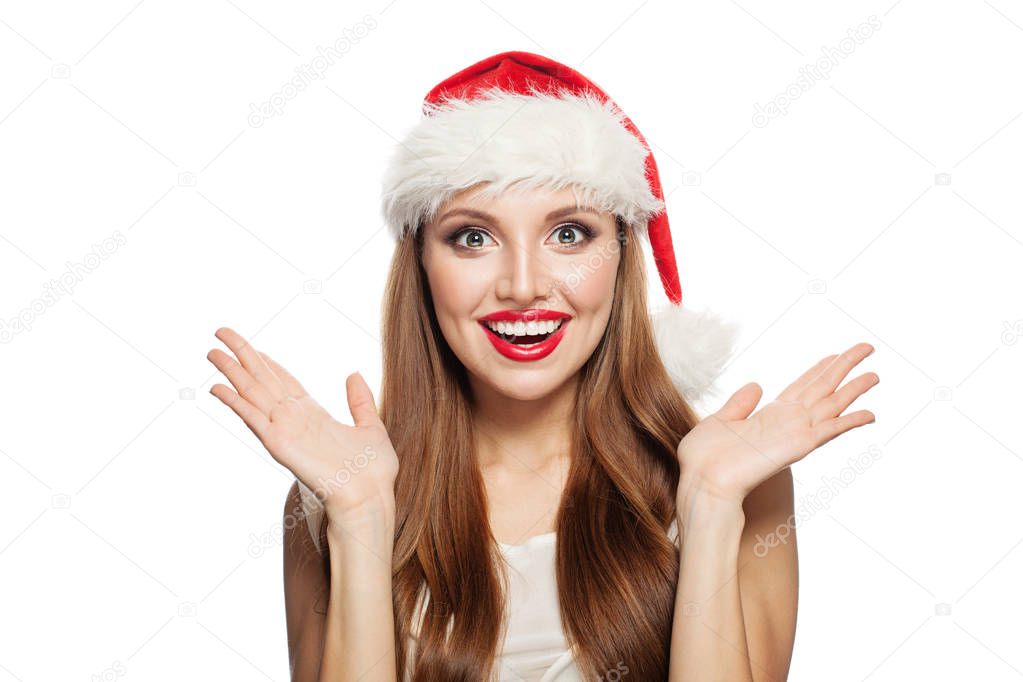 Christmas woman wearing Santa hat isolated on white. 