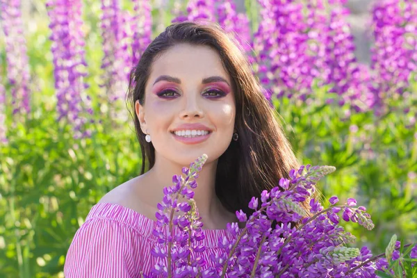 Summer woman with colorful flowers portrait