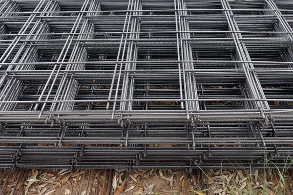 Steel wire concrete reinforcement mesh used in construction. Industrial background.