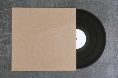 White label vinyl record and generic blank cardboard sleeve. Design element with copy-space for your logo or artwork. clipart