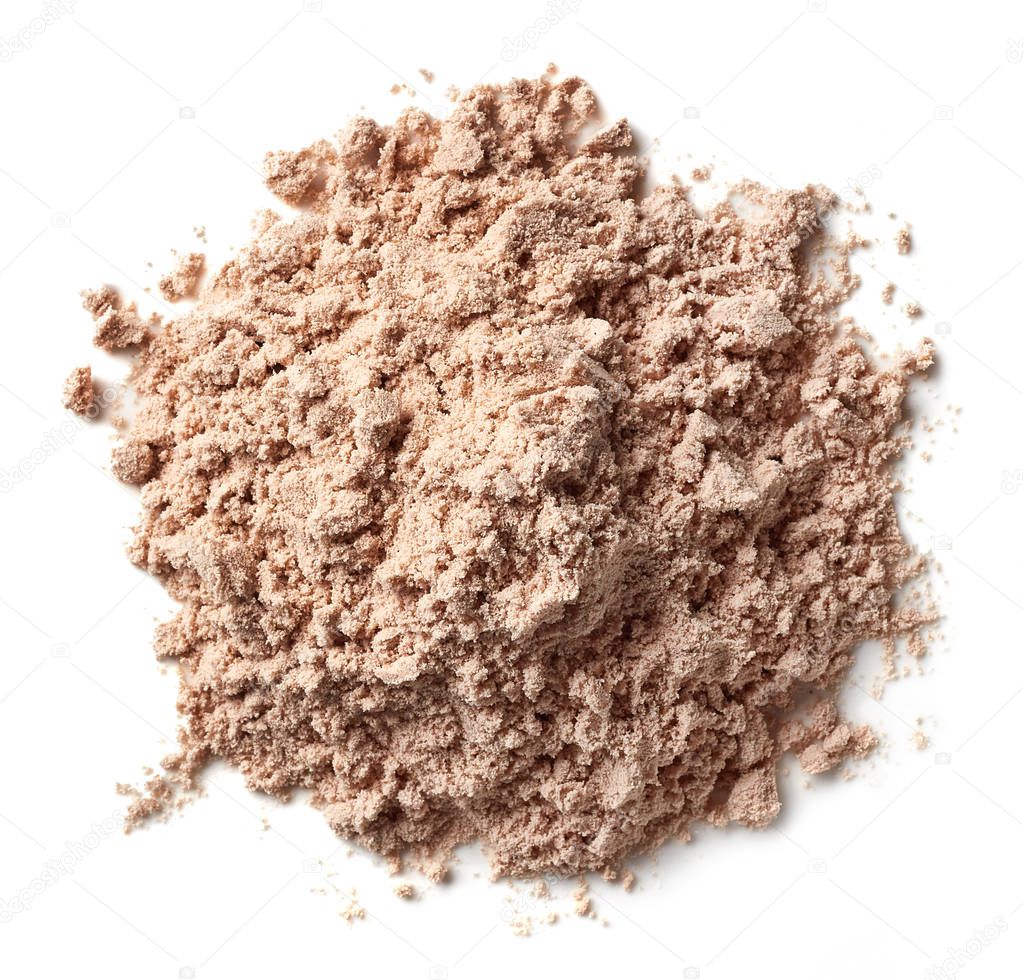 Heap of brown chocolate protein powder isolated on white background. Top view