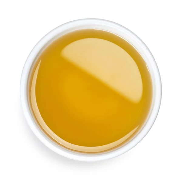 一碗新鲜的额外的处女橄榄油被隔离在白色背景 顶部视图 — 图库照片