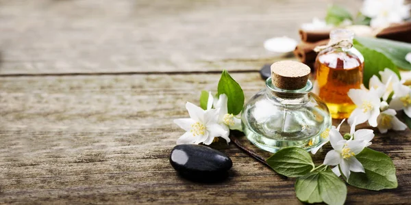 Spa treatment with massage jasmine oil still life — Stock Photo, Image