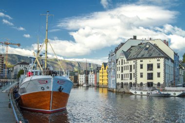 Alesund is a city in the Norwegian fjords. clipart