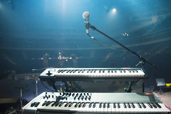 the piano on stage in the spotlight. Before the concert