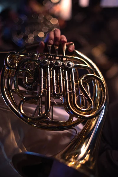 Man playing a horn — Stock Photo, Image