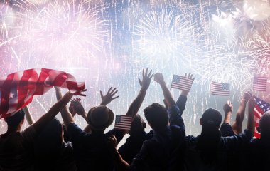 Patriotic holiday. Silhouettes of people holding the Flag of the USA. America celebrate 4th of July. clipart