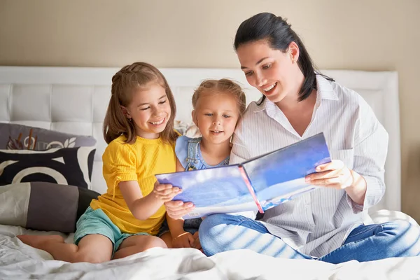 Happy Loving Family Pretty Young Mother Reading Book Her Daughters — Stock Photo, Image