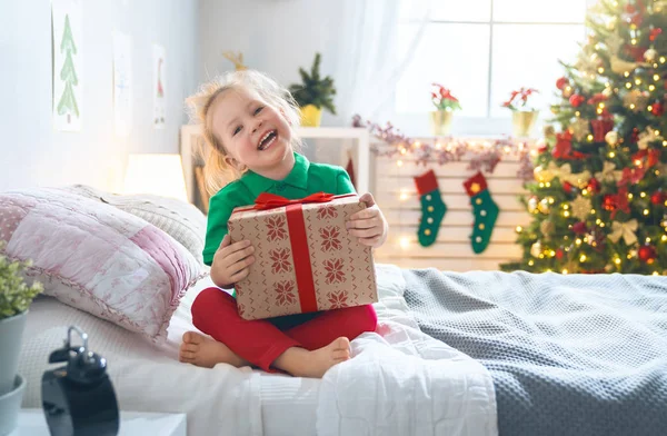 Happy Holidays Cute Little Child Opening Present Christmas Tree Girl — Stock Photo, Image