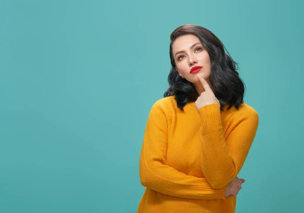 Thoughtful Beautiful Young Woman Yellow Sweater Posing Hands Chin Turquoise — Stock Photo, Image