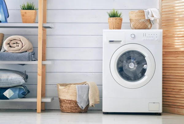 Laundry room with a washing machine — Stock Photo, Image