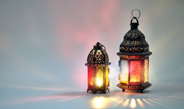 Arabic lantern with burning candle clipart