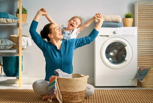 Family doing laundry — Stock Photo, Image