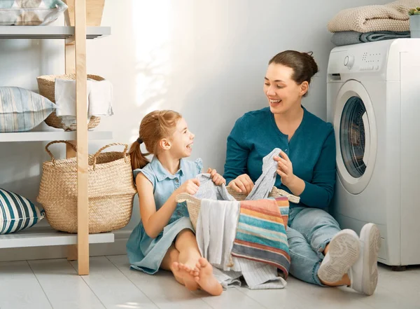 Family doing laundry — Stock Photo, Image