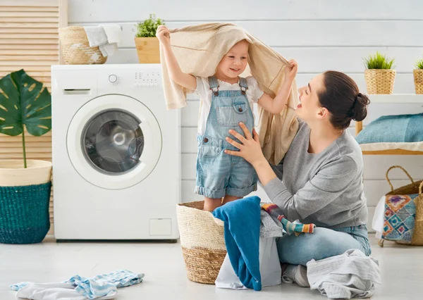 Family doing laundry — Stock Photo, Image