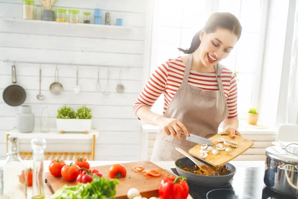 Woman is preparing proper meal — 스톡 사진