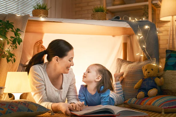 Mom and child reading a book — Stock Photo, Image