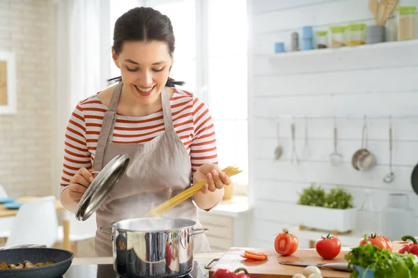 Woman is preparing proper meal — 스톡 사진