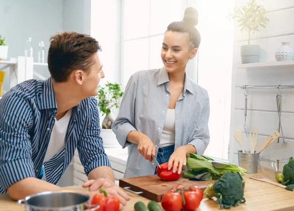 Loving couple is preparing the proper meal — Stock Photo, Image