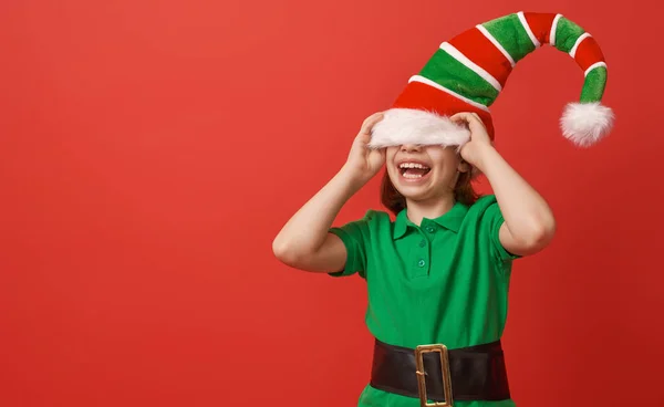 Santa's elf on bright color background — Stockfoto