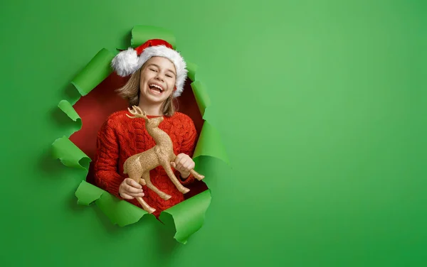 Girl in Santa hat on color background — Stock Photo, Image
