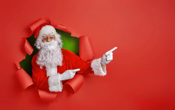 Santa Claus sobre fondo de color . —  Fotos de Stock