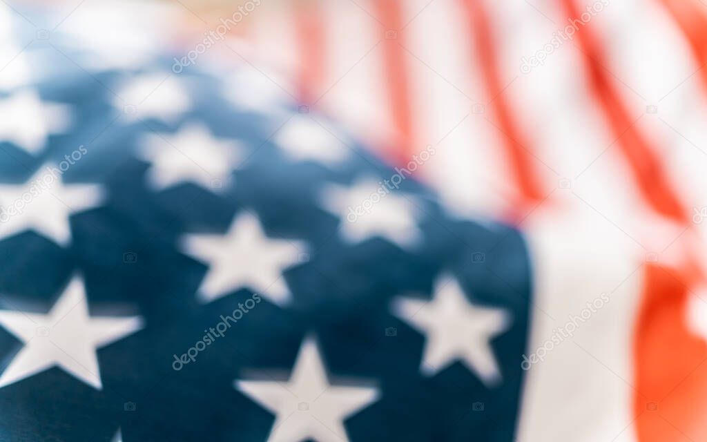 Patriotic holiday. The USA are celebrating 4th of July. American flag close up.